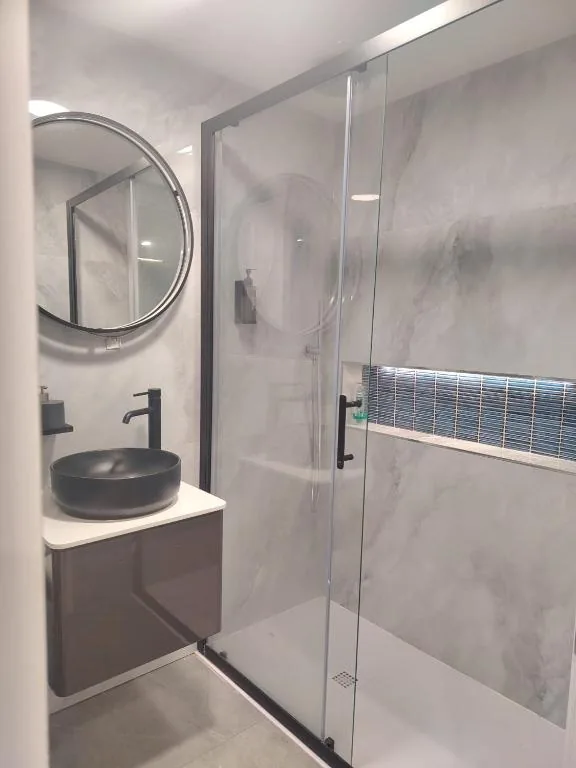 Bathroom with glass walk-in shower